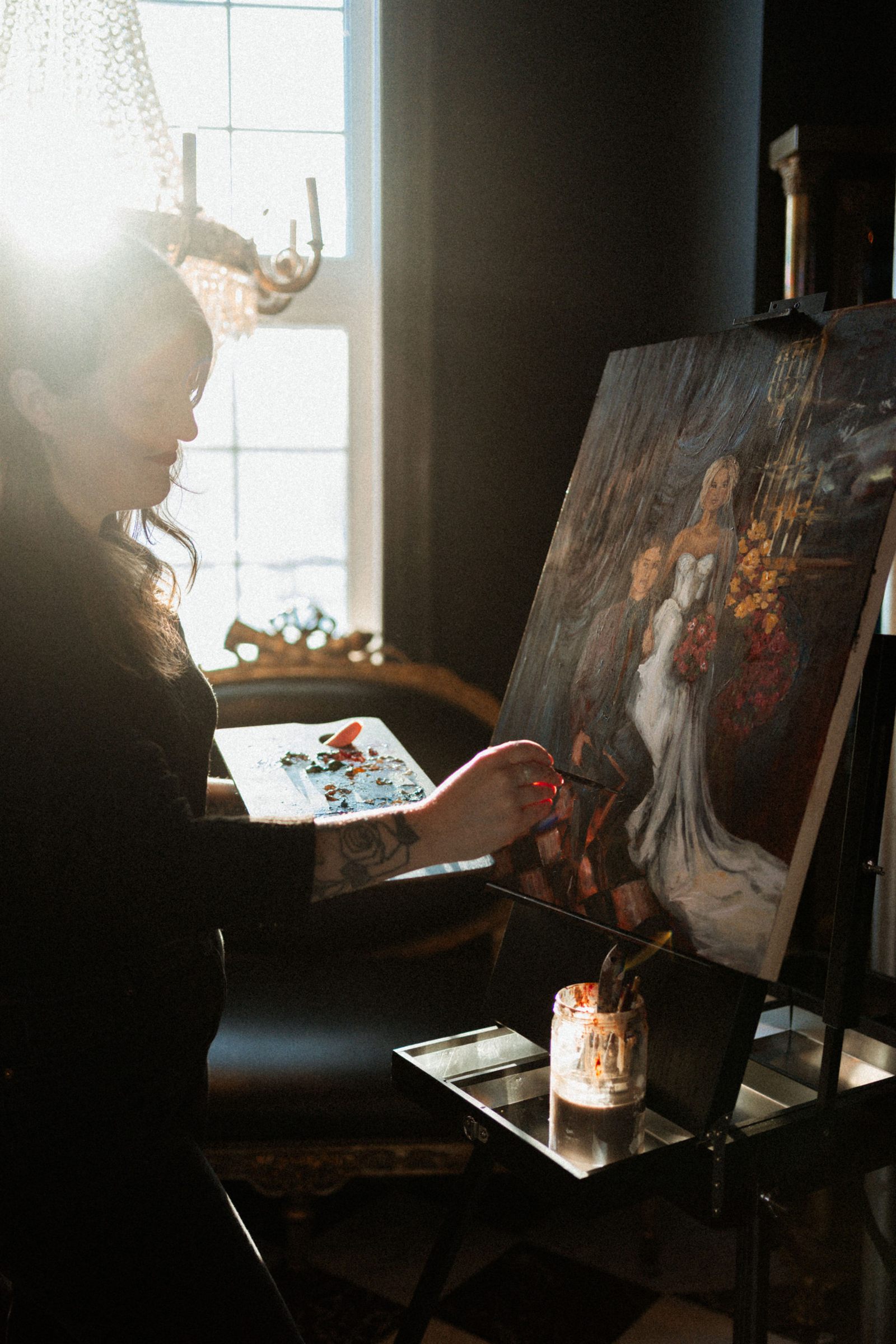Artiste peignant en direct pendant un mariage au Manoir Blackswan