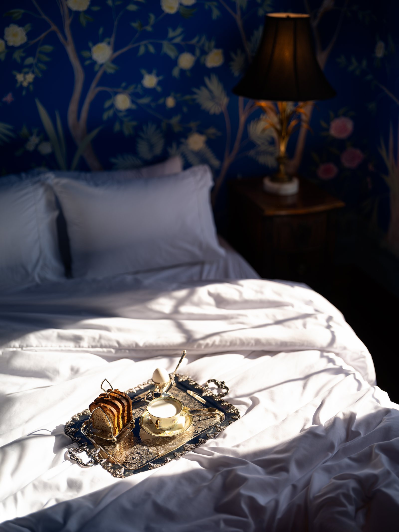 Sunday breakfast on a silver tray in a bedroom of Manoir Blackswan, the morning after the wedding